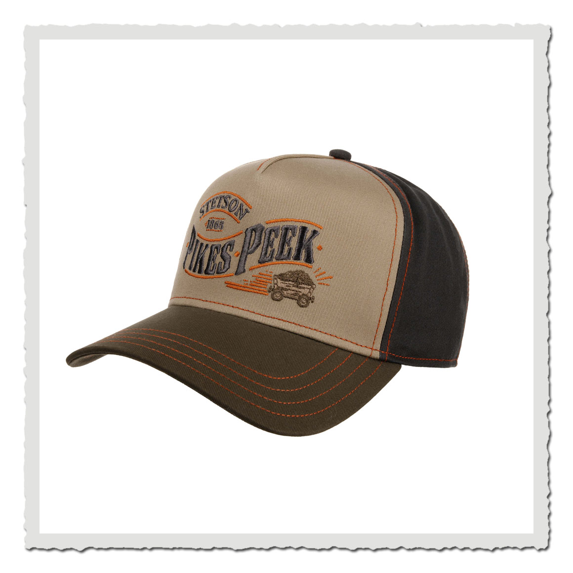 Beige-grüne Stetson Trucker Cap mit Pikes Peak Stickerei und braunem Schirm.